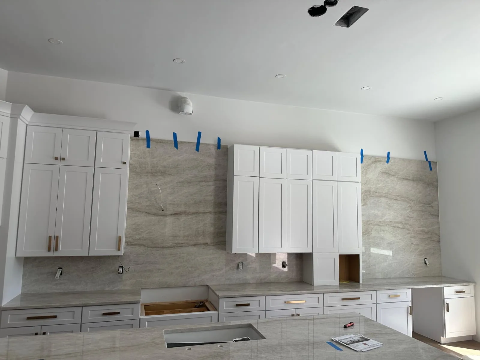 Full-Height Backsplashes project by Planet Granite