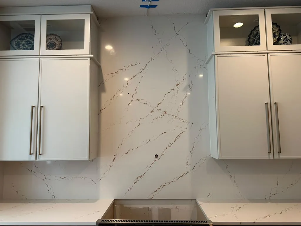 Full-Height Backsplashes project by Planet Granite